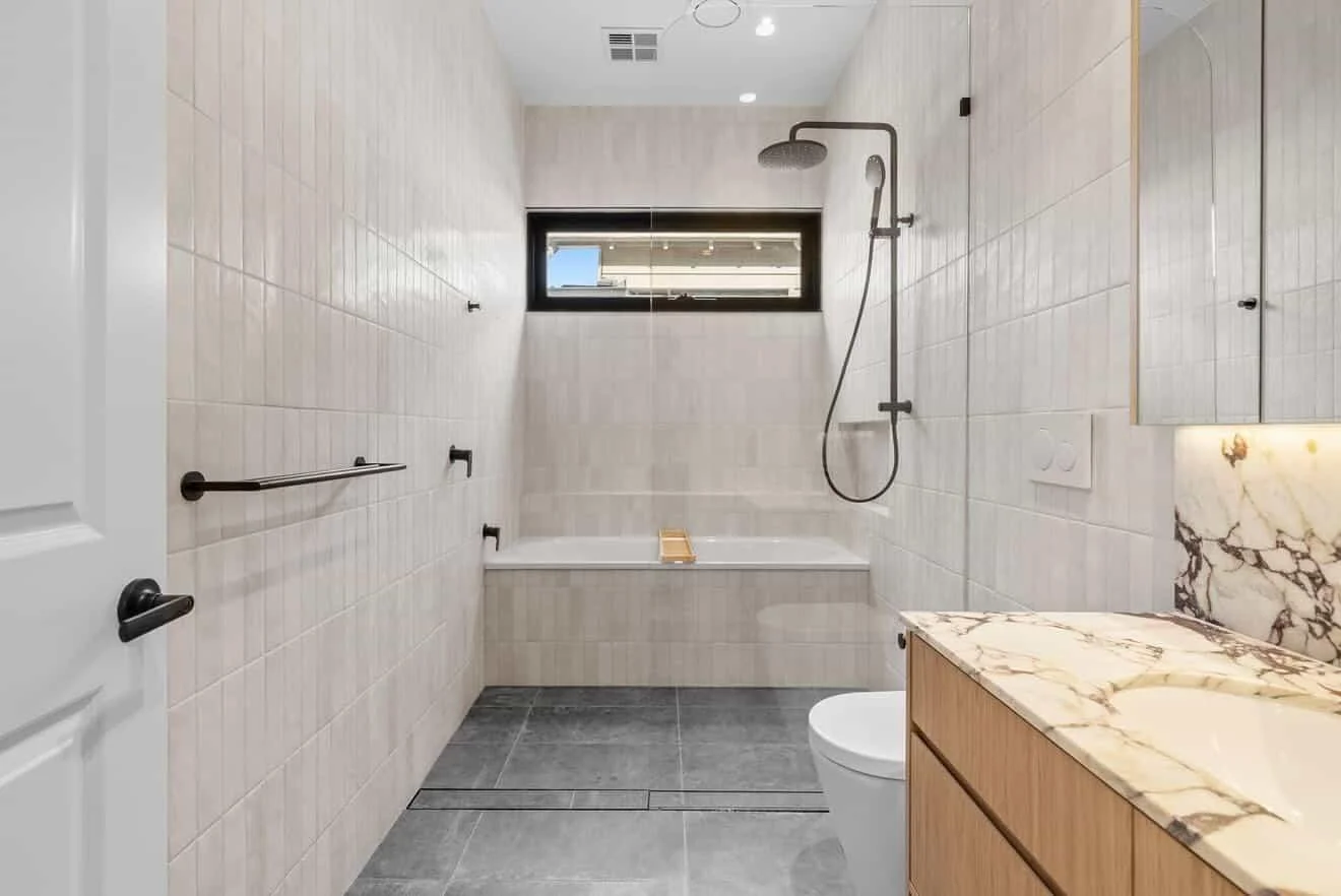 Completed bathroom renovation by Elite Flow Plumbing