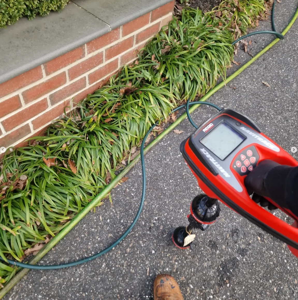 CCTV camera conducting drain inspection